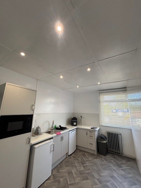 Recessed ceiling lighting installed in a commercial kitchenette